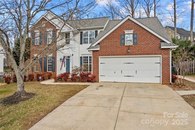 front facade featuring a garage and a front yard