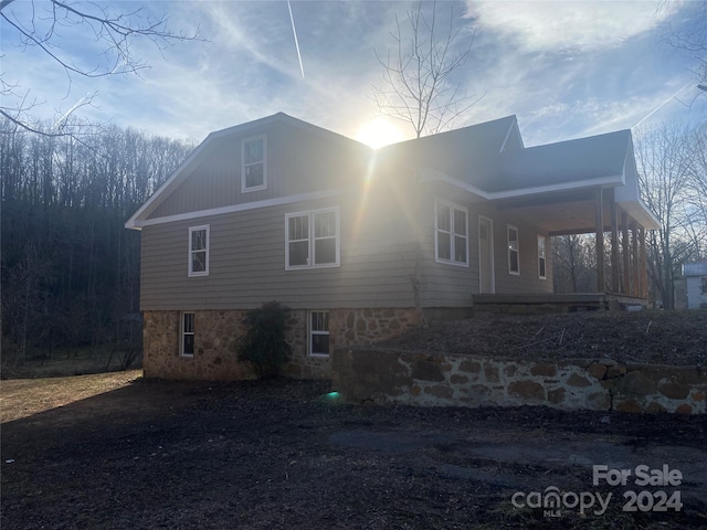 view of property exterior at dusk