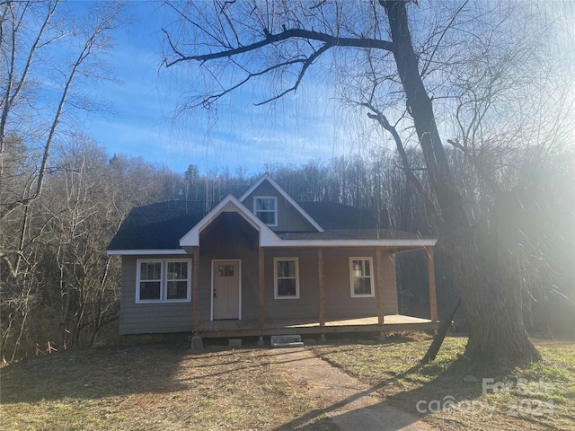 view of front of property featuring covered porch