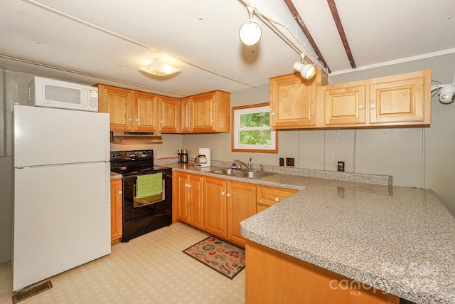 kitchen featuring sink, white appliances, kitchen peninsula, and light stone counters