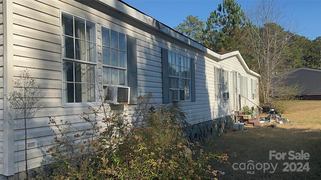 view of property exterior featuring cooling unit