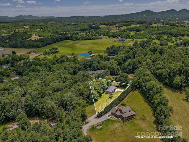 drone / aerial view featuring a mountain view