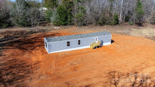 view of entry to storm shelter