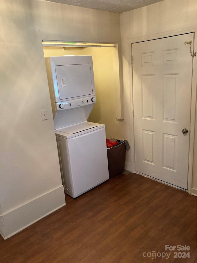 100 Normandy Dr, Morganton, NC 28655 - laundry area with laundry area, stacked washer and dryer, and dark wood-style floors