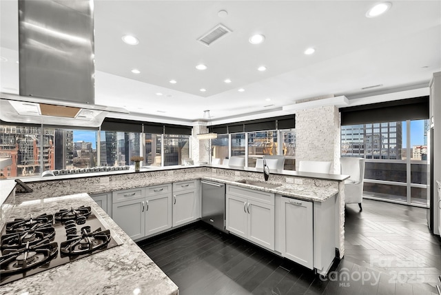 kitchen with sink, gas cooktop, dishwasher, white cabinetry, and light stone counters