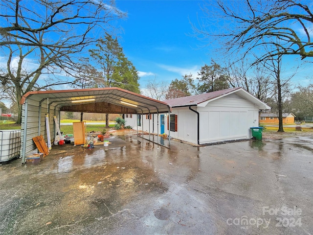 garage with a carport