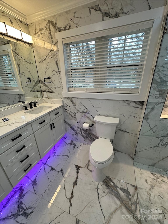 bathroom with toilet, vanity, ornamental molding, tile walls, and tile floors