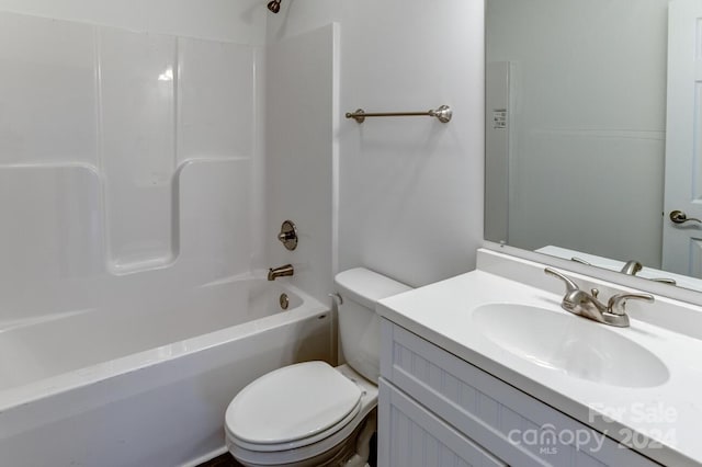 full bathroom featuring bathtub / shower combination, toilet, and vanity