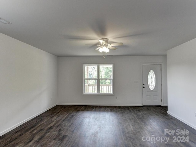 foyer entrance featuring dark hardwood / wood-style floors and ceiling fan