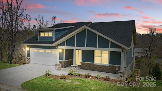 craftsman-style house featuring roof with shingles, an attached garage, stone siding, and concrete driveway