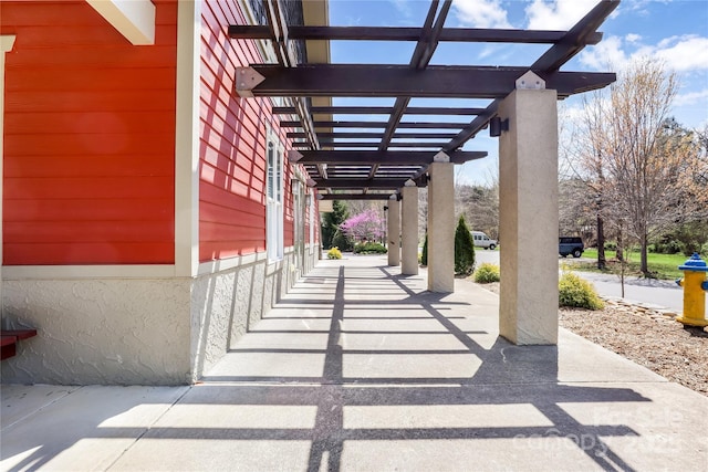 view of patio featuring a pergola