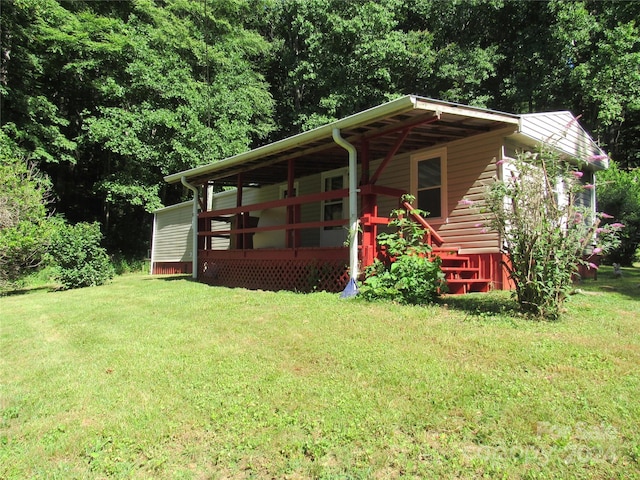 exterior space featuring a front lawn