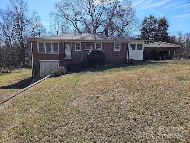 ranch-style home with a carport, a front lawn, and a garage