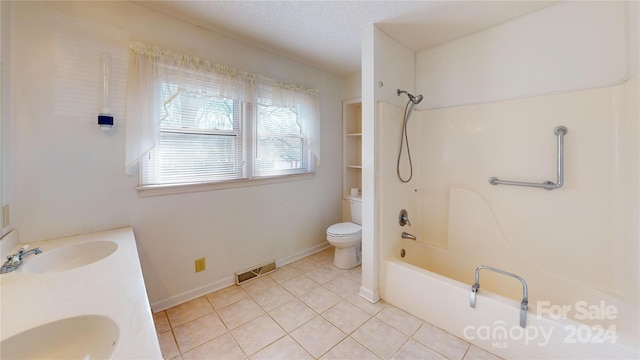 full bathroom with double sink vanity, bathtub / shower combination, toilet, a textured ceiling, and tile floors