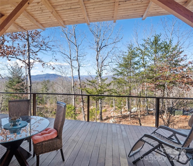 wooden deck featuring a mountain view