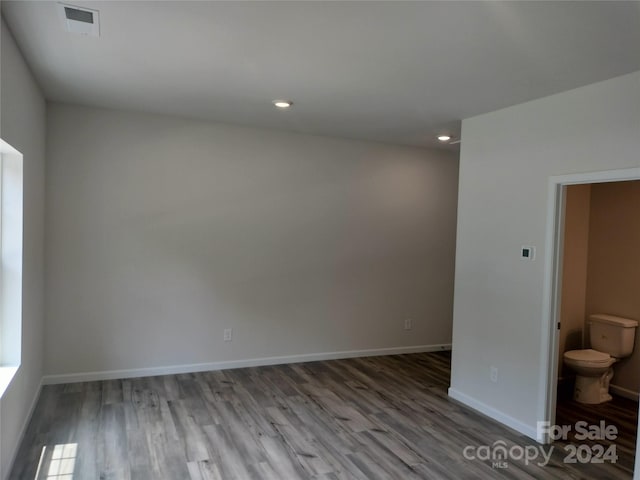 empty room featuring hardwood / wood-style flooring