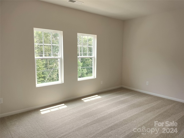 view of carpeted spare room