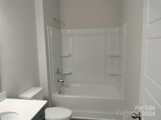 full bathroom featuring vanity, shower / bathing tub combination, and toilet