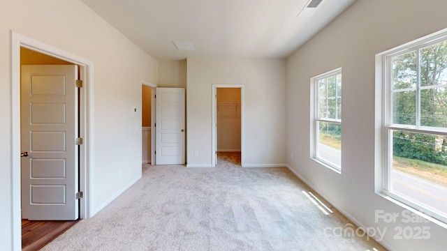 4223 S New Hope Rd Unit 8, Gastonia, NC 28056 - unfurnished bedroom with light carpet, a spacious closet, and a closet