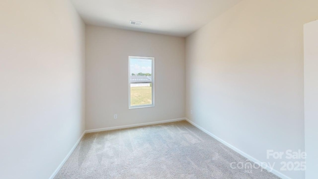 4223 S New Hope Rd Unit 8, Gastonia, NC 28056 - empty room featuring carpet flooring and baseboards