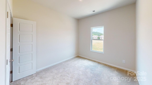 4223 S New Hope Rd Unit 8, Gastonia, NC 28056 - empty room with light carpet and baseboards
