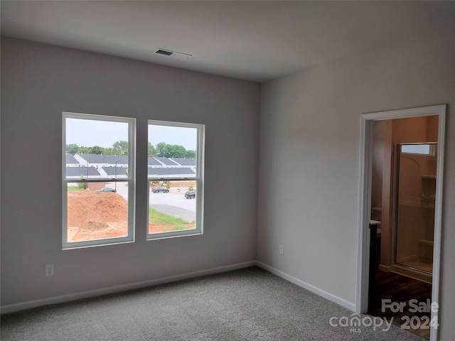 view of carpeted spare room