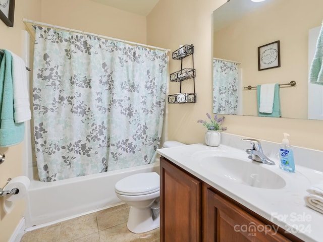 full bathroom with tile patterned flooring, toilet, vanity, and shower / bathtub combination with curtain