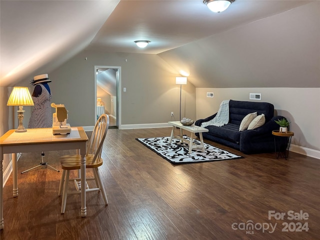 living area featuring wood-type flooring and lofted ceiling