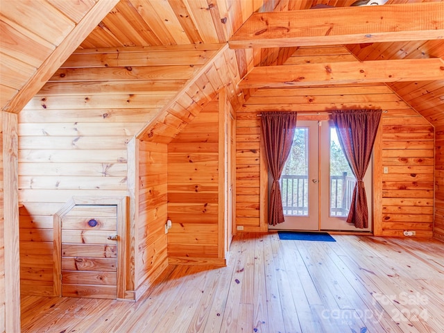 bonus room with hardwood / wood-style flooring, wood ceiling, wooden walls, and vaulted ceiling