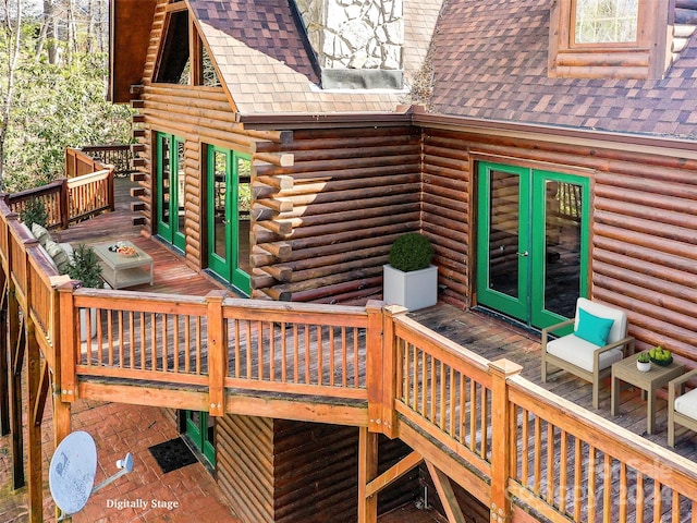 wooden deck with french doors