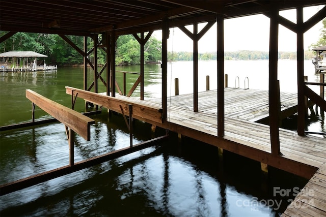 view of dock with a water view