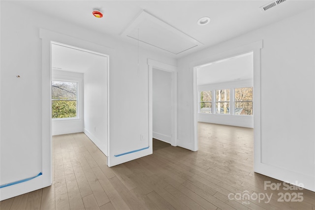 spare room featuring hardwood / wood-style floors