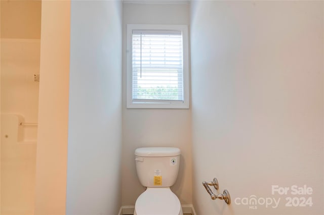 bathroom featuring toilet