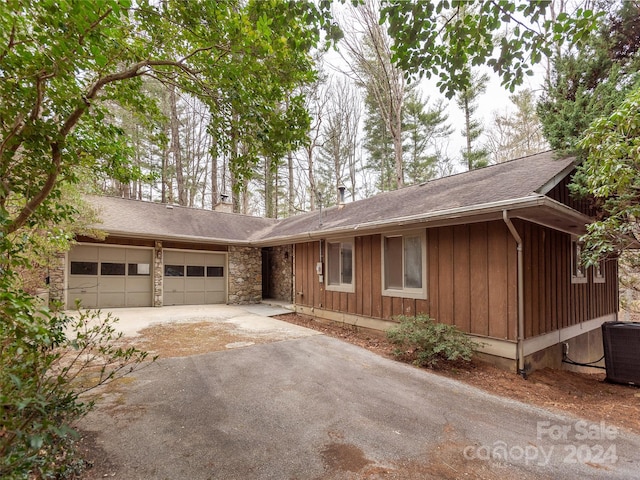 single story home with a garage