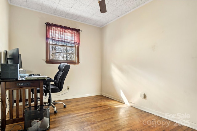 office area with hardwood / wood-style flooring and ceiling fan