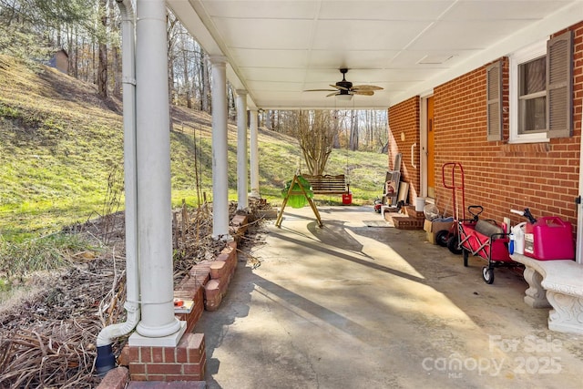 view of patio featuring ceiling fan and covered porch