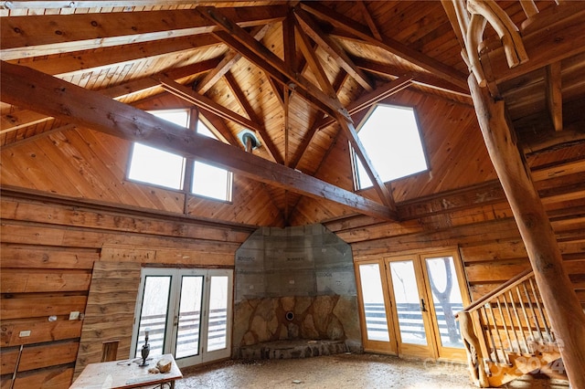 unfinished attic featuring a skylight