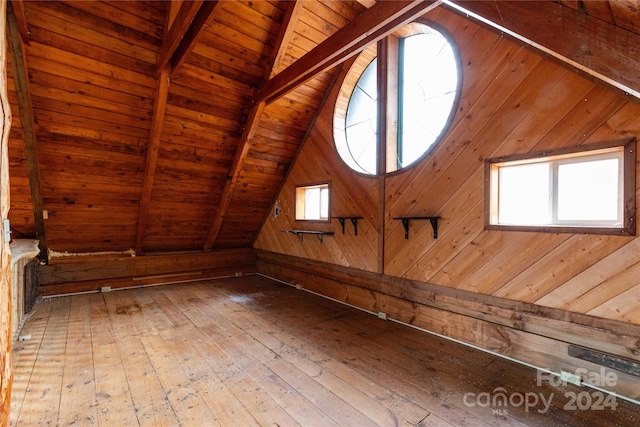 attic featuring a wealth of natural light