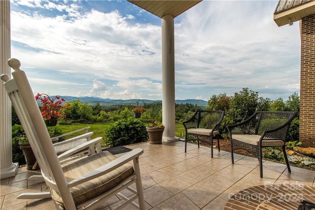 view of patio with a mountain view