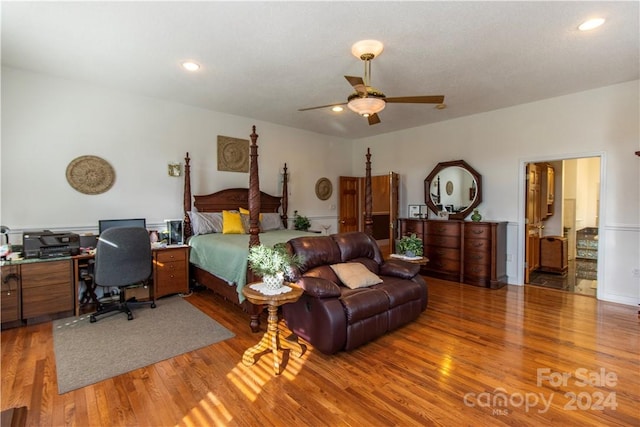 bedroom featuring wood-type flooring and ceiling fan