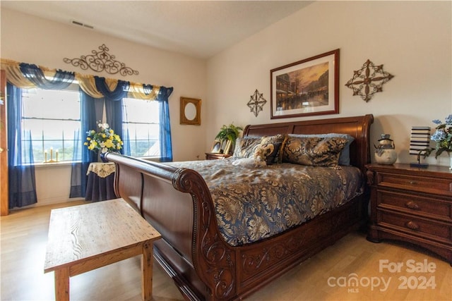 bedroom featuring light hardwood / wood-style floors