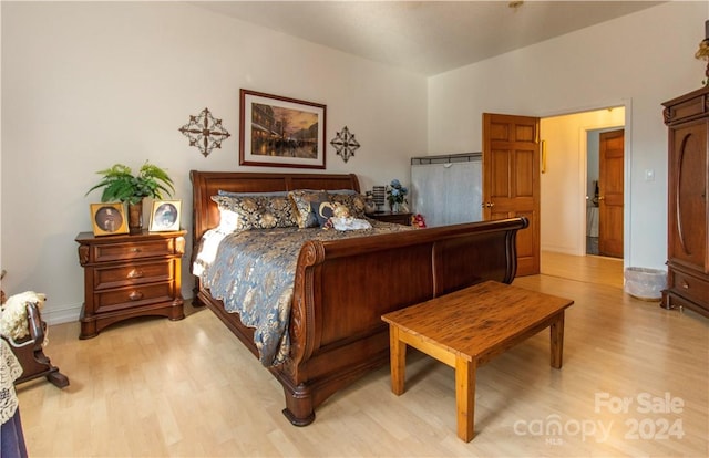 bedroom with light wood-type flooring