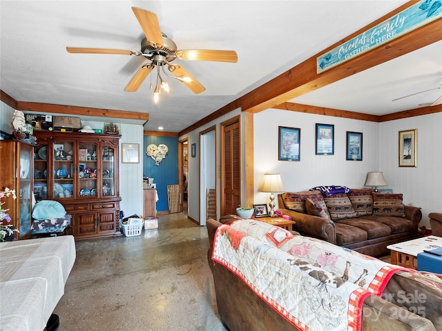 living area with concrete flooring and a ceiling fan