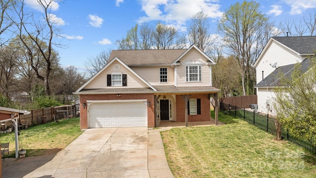 view of front property with a front lawn and a garage