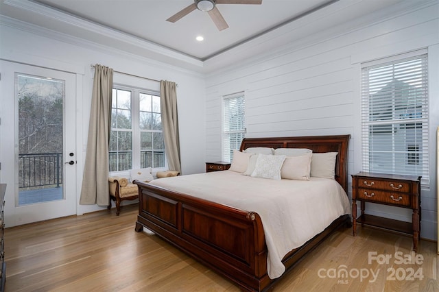 bedroom featuring light wood-type flooring, access to outside, ceiling fan, and ornamental molding