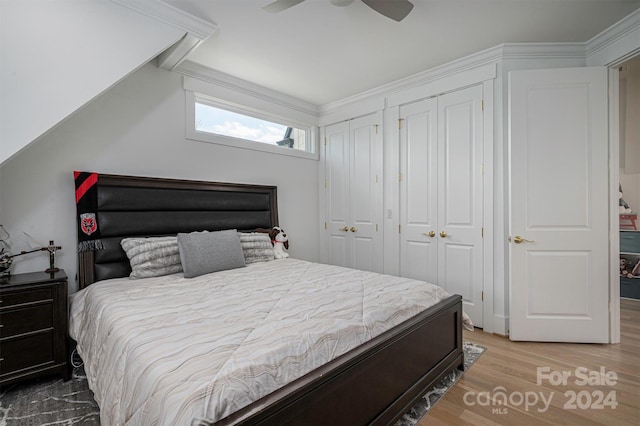 bedroom with light hardwood / wood-style flooring and ceiling fan