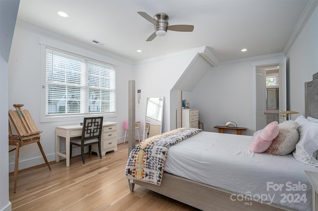 bedroom featuring light hardwood / wood-style floors, ceiling fan, and crown molding