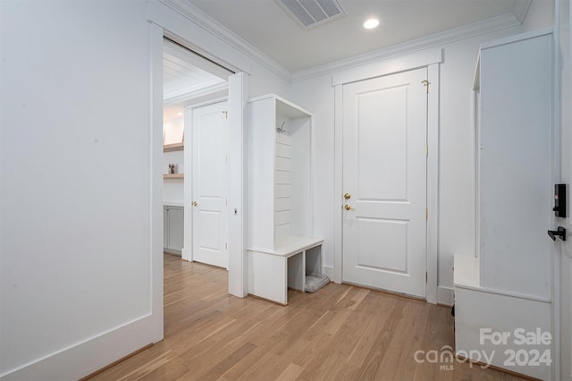 mudroom featuring light hardwood / wood-style floors and ornamental molding