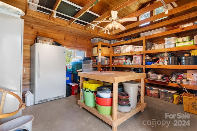 storage area featuring ceiling fan