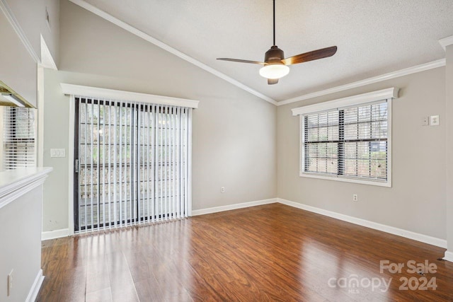 empty room with dark wood-type flooring, ornamental molding, and ceiling fan